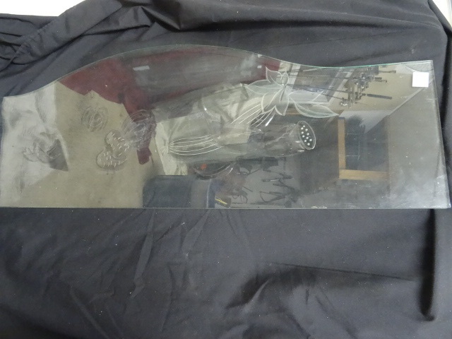Etched glass designed to go on the ...