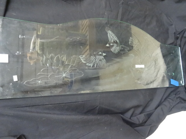 Etched glass designed to go on the ...