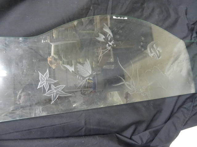 Etched glass designed to go on the ...