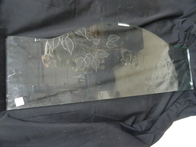Etched glass designed to go on the ...