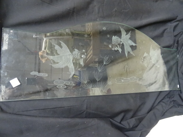 Etched glass designed to go on the ...