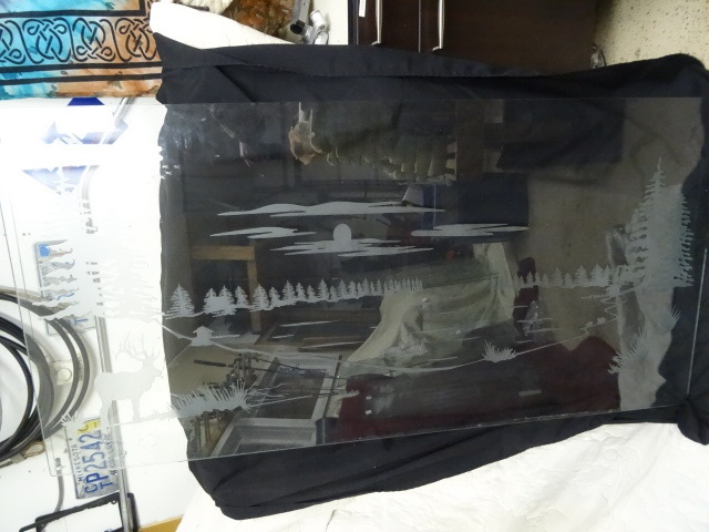 Tempered glass with etched wildlife...