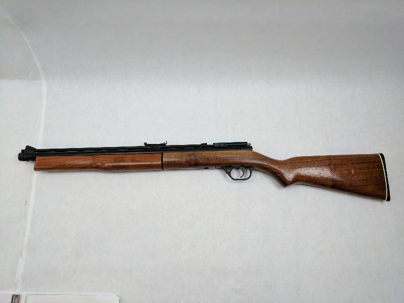 lot 4 image: Crossman Arms Co. Sheridan Blue Streak Air Rifle 20 Caliber Wood Stock Blue Barrel