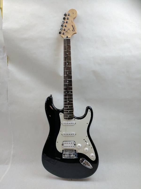 lot 16 image: Squier Affinity Series Stratocaster Electric Guitar, 21 Frets, C Shape Neck, Maple Fingerboard, Passive Pickup, Polyurethane, Black