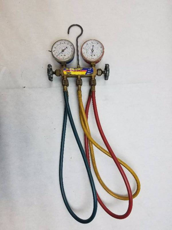 lot 208 image: Ritchie Yellow Jacket Manifold With Hoses R12 R22 R502 GOOD WORKING CONDITION