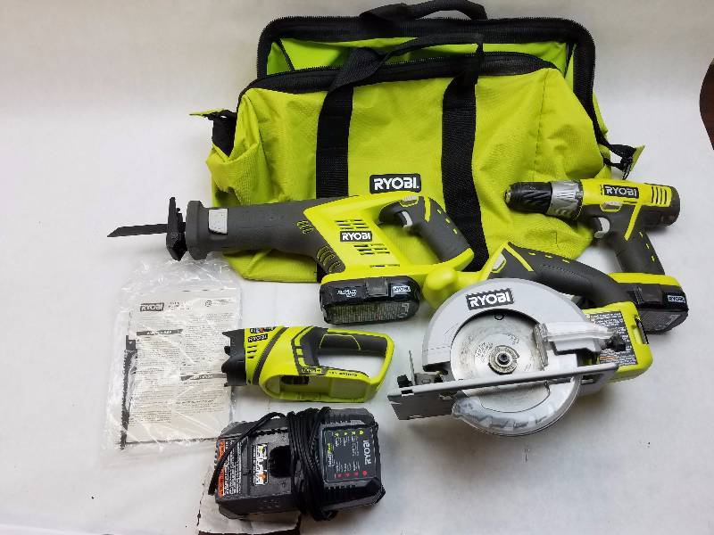 lot 221 image: Ryobi Lot of 4 - Ryobi P271 Drill-Driver, Ryobi P515 ONE Plus Reciprocating Saw, Ryobi One P504G Cordless Circular Saw, Ryobi P704 Area Light, Battery Charger, 2 18V batteries, Manuals, and Soft Carry Case EXCELLENT WORKING CONDITION