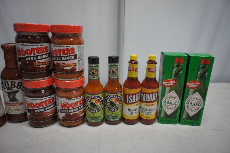 Lot of 16 BottlesJars of Assorted Hot and BBQ Sauces - All Items Are In Date -