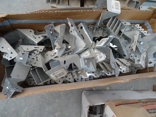 lot 25 image: 2 boxes of joist hangers...