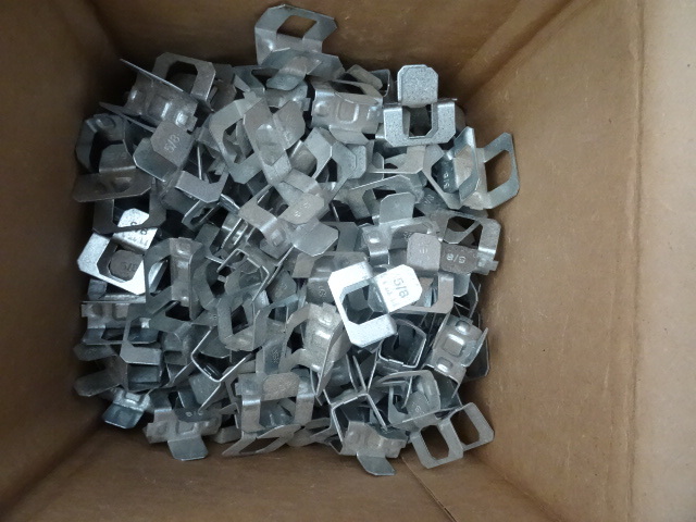 lot 29 image: 5 gal bucket and 2 boxes of plywood...