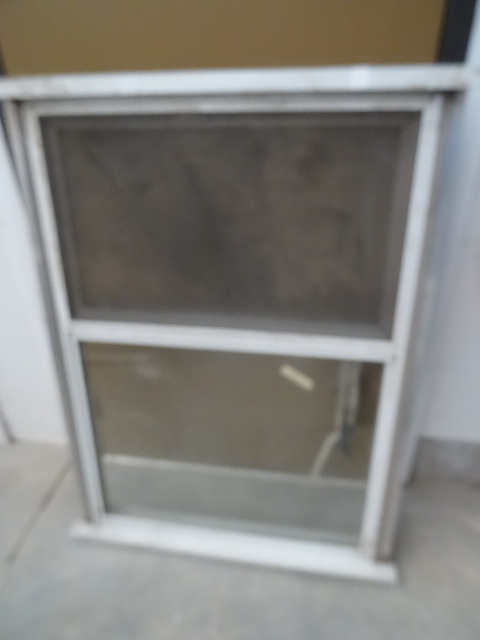 lot 49 image: Aluminum window. Up and down slider...