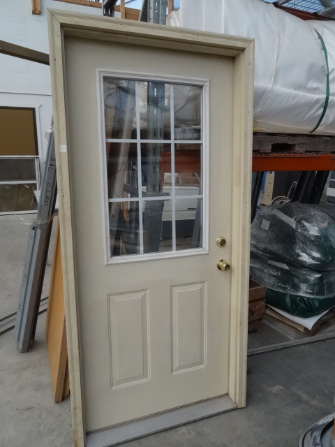 lot 80 image: Exterior wood entry door with frame...