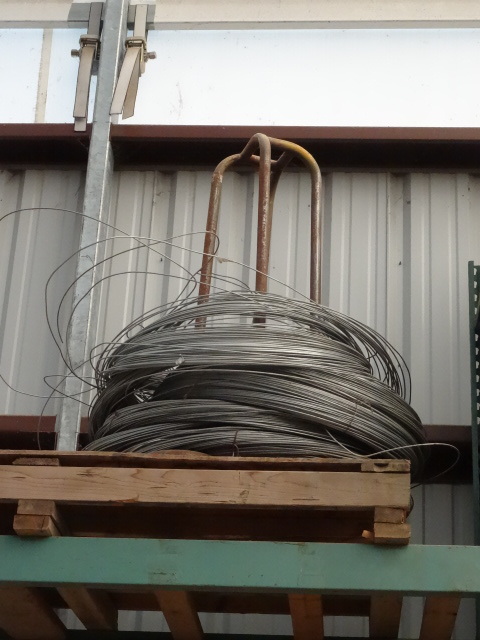 lot 96 image: #9 galvanized wire with spool holde...