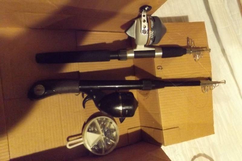 lot 39 image: Fishing Poles and Toy Cars