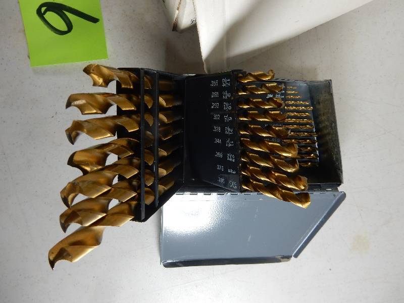 lot 16 image: Drill Bit set and 2 Pneumatic tools.    See closeups.. These tools have been on the shelf for about 6 years so will need some oiling to make them work.
