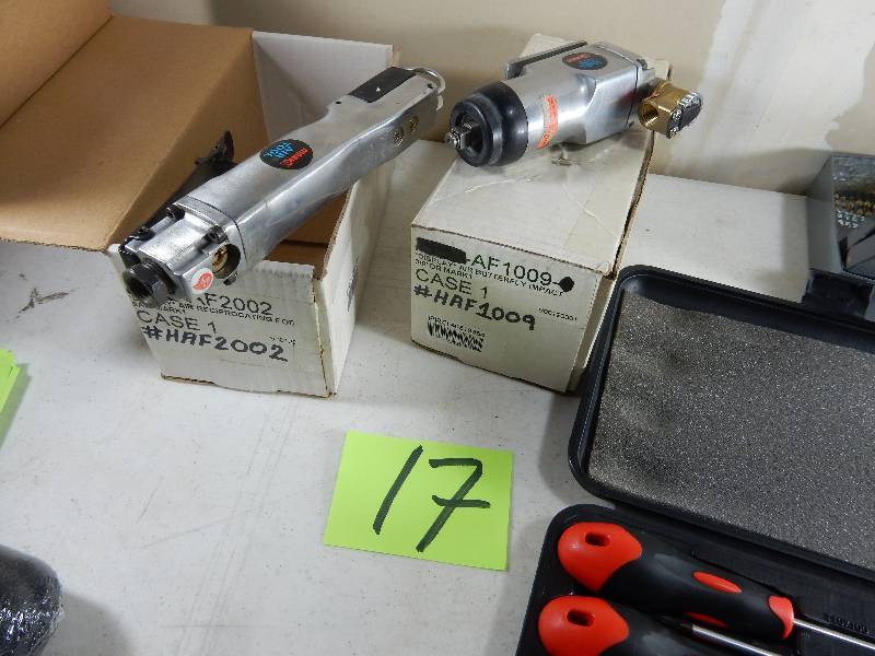 lot 17 image: Set of Star Key Driver set, Set of Drill Bits, 2 Pneumatic tools a shown. These tools have been on the shelf for about 6 years so will need some oiling to make them work.