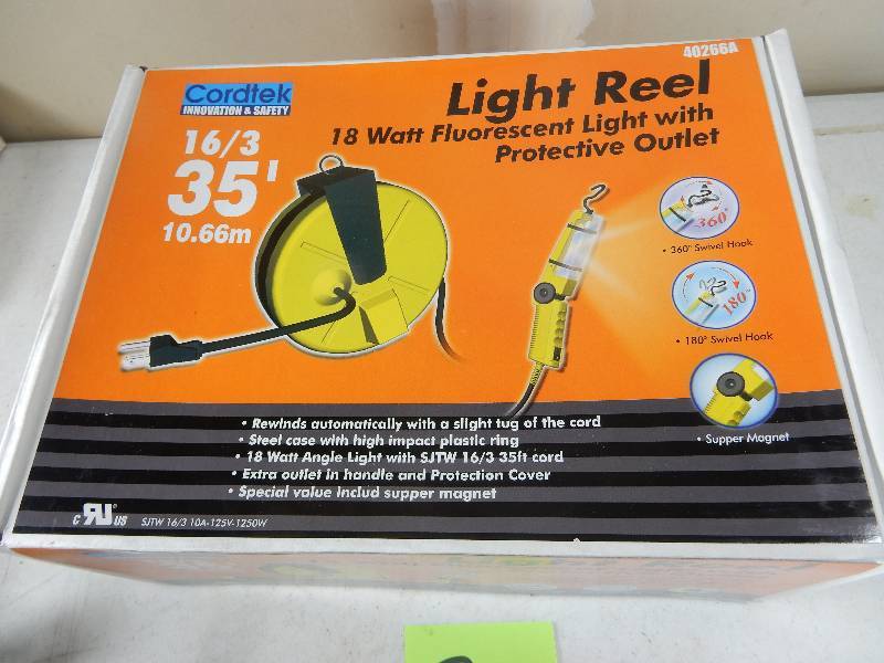 lot 25 image: 35 Ft Light Reel.  New in the box