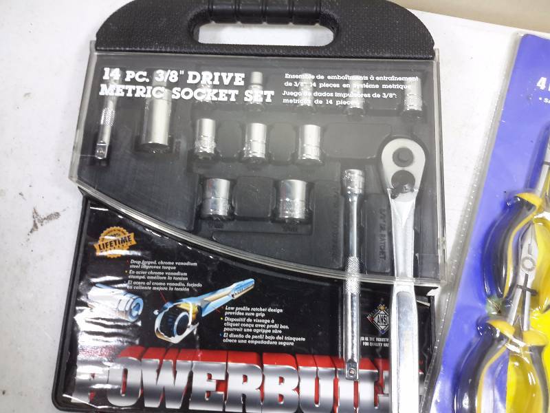 lot 64 image: Powerbuilt, 14 pc 38 in drive metric socket set Adjustable length Ratchet, 4 piece 6 in Mini Pliers set
