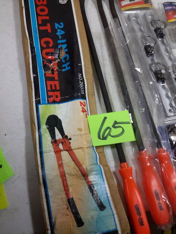lot 65 image: 24in Bolt Cutter, 3 pry bars, misc. Tie Down rings and bolts