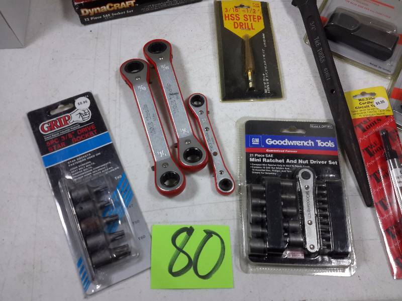 lot 80 image: Misc. Wrenches, Sockets, Ratchet, Fuses, HSS Step Drill, Cutter, Knives as pictured