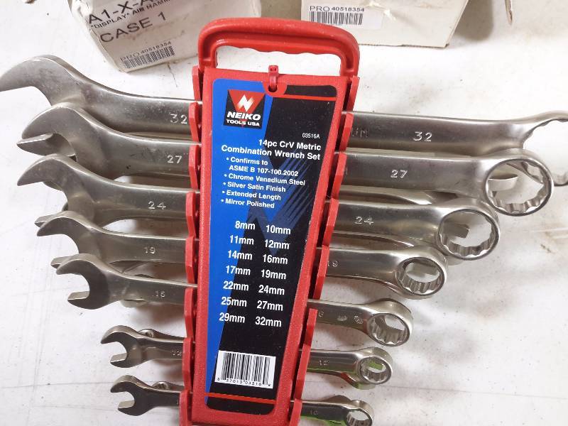lot 39 image: 2, Pneumatic Tools as shown. These Pneumatic Tools have been sitting on a shelf for 6 years..Never used. They will need some inside oiling before they will work properly.  Neiko Metric Combination Wrench set