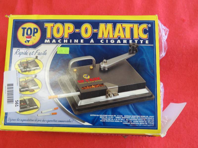 lot 561 image: Cigarette roller