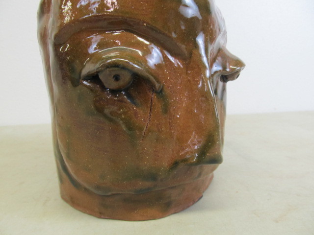 lot 16 image: Unusual Pottery Face Jug