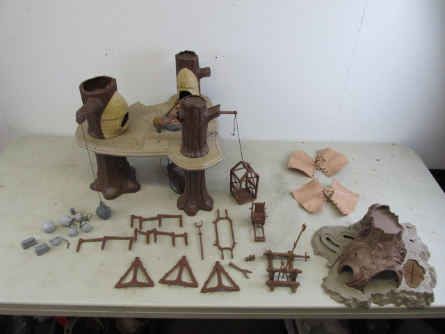 lot 53 image: Vintage Star Wars EWOK Village & Dagobah Playsets