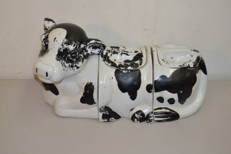lot 51 image: Cow Canisters