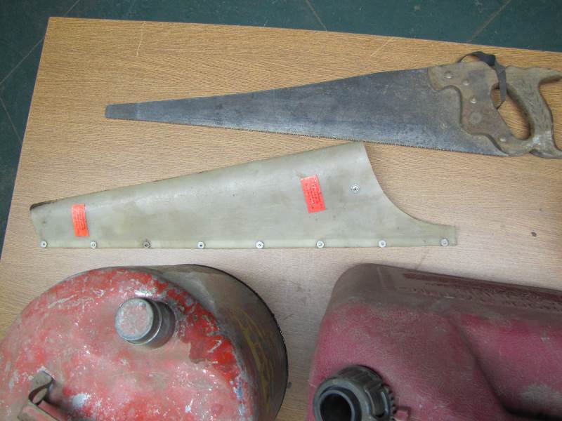 Gas Cans and Hand saw