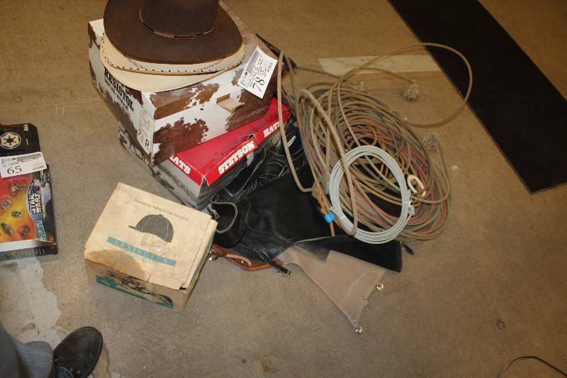 lot 78 image: Cowboy Equipment Includes Ropes, 5-Hats, Riding Helmet, 2-Leather Chaps, 1-Pair Size 8E Tony Lama Boots