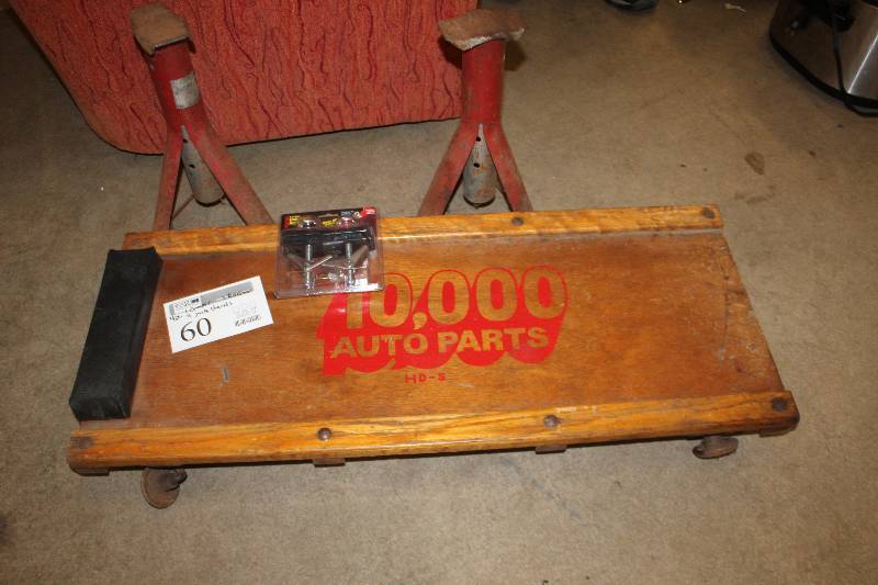 lot 60 image: Lot of (4) Tools Includes 1) Creeper AND 1) Anchor AND 2) Jack Stands