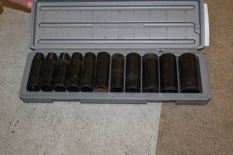 lot 52 image: 12-Piece Deep 12in. Drive Air Impact Socket Set