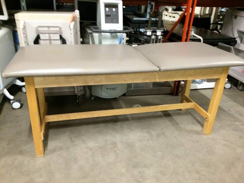 lot 52 image: Retails Used $700 Physical Therapy Table wAdjustable Back Extra Heavy Duty H-Brace Medical Examination Exam Upholstered Padded Treatment Table - Super Nice Condition