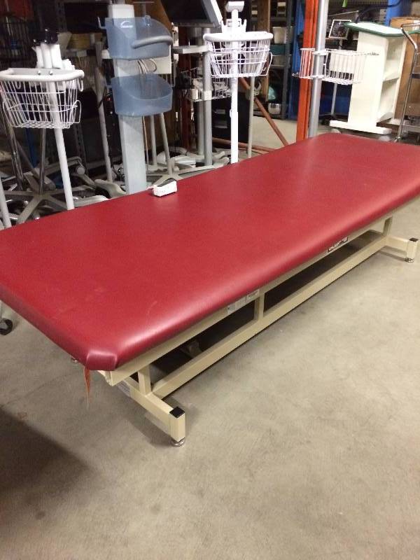 lot 54 image: WOWOW Retails Used $1800 Chattanooga Power Adapta High Low Hi Lo Treatment Physical Therapy Table With Foot Switch - Motor Made In West Germany Excellent Condtion