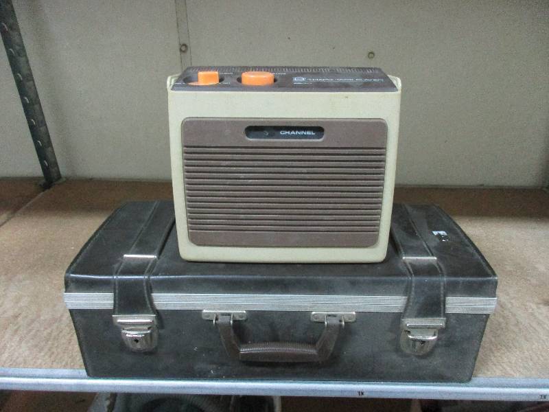 8 track player and case full of 8 tracks