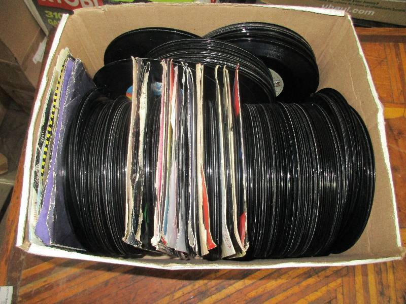 200 vintage rock and county 45s