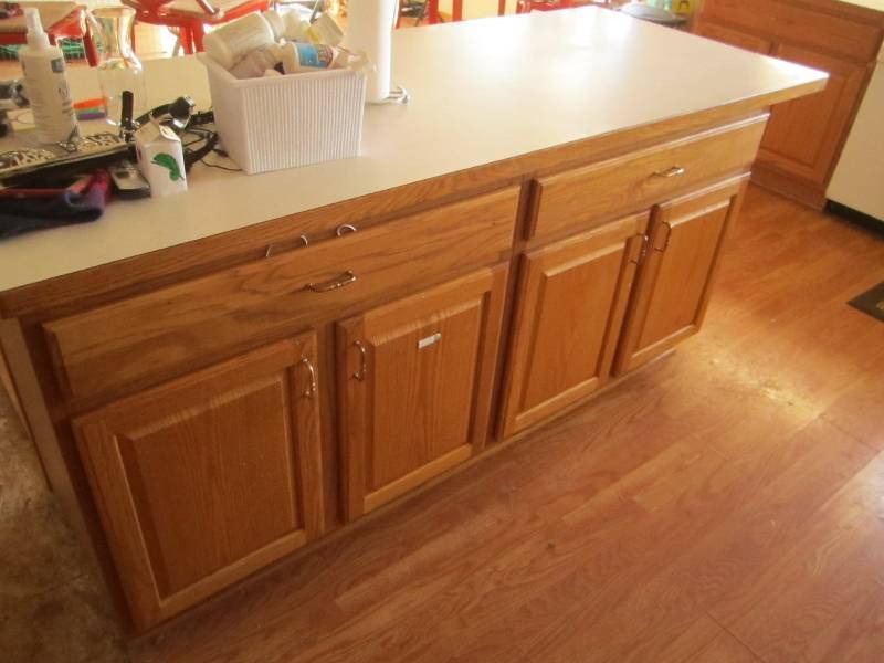 Complete set of kitchen cabinets and center island.
