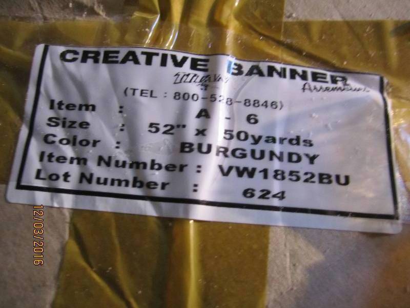 Roll of burgundy banner making mate...