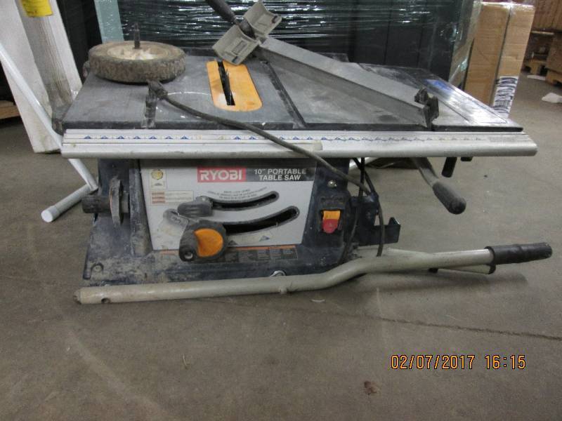 lot 40 image: 10 inch Ryobi PortableTable Saw...