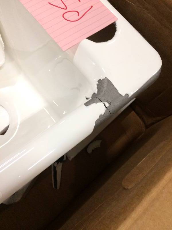 lot 16 image: Kohler Riverby Undermount Cast-Iron 33 in. 5-Hole Single Bowl Kitchen Sink with Accessories in Sandbar not used but damaged on corner and front edge see pictures