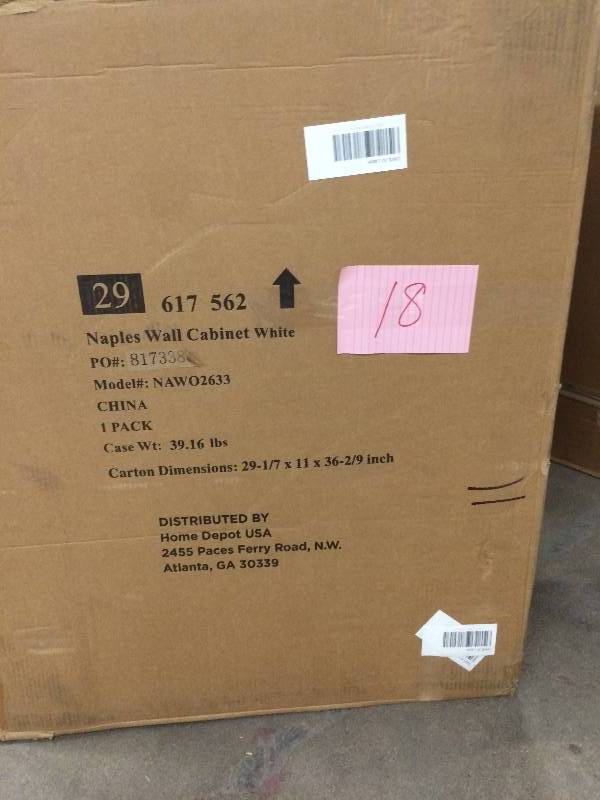 lot 18 image: Foremost Naples 26-12 in. W x 32-34 in. H x 8 in. D Bathroom Storage Wall Cabinet in White damaged on top