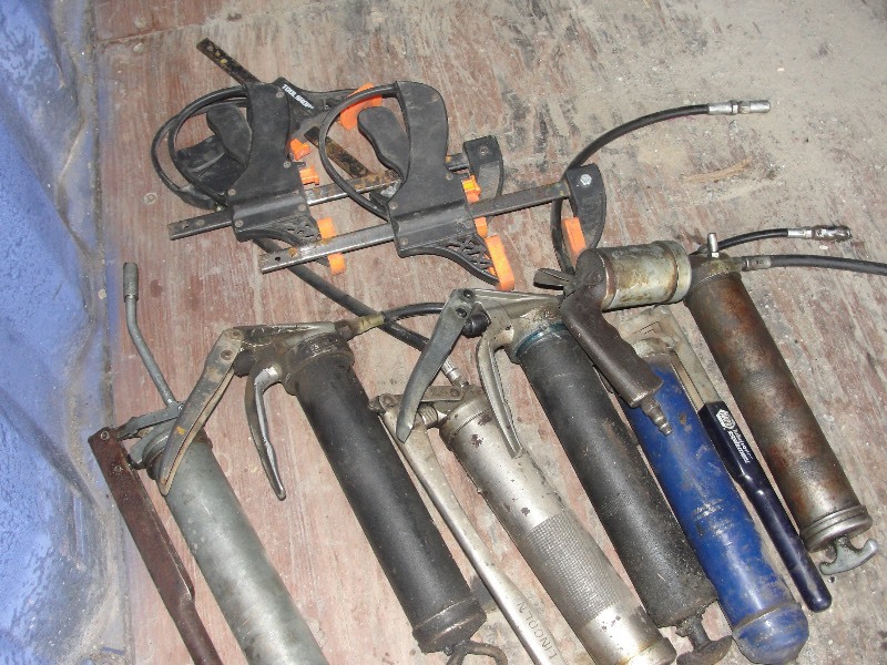 lot 10 image: Grease Gun and Clamps