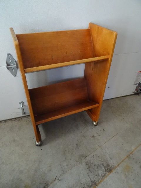 lot 3 image: Wood book shelf on wheels. 22 x 12 ...