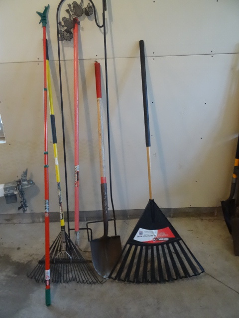 lot 54 image: Garden shepard hooks. Rakes. Shovel...