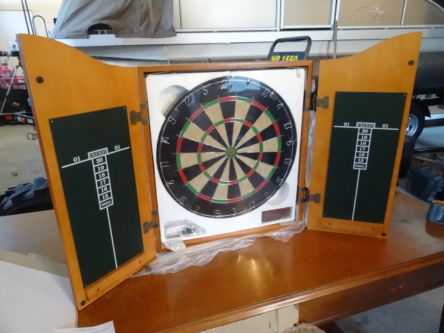 lot 78 image: Brand new wall mounted dart board. ...