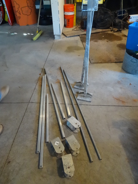 lot 94 image: Aluminum dock parts. 2 complete leg...