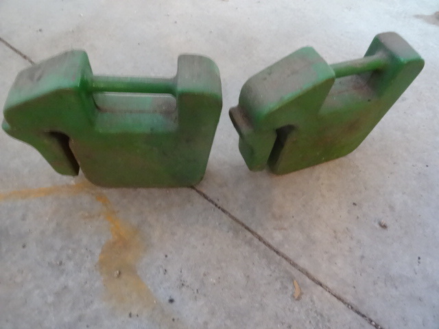 lot 106 image: 2 rear tractor weights for John Dee...