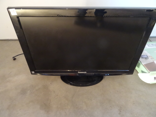 lot 117 image: Panasonic flat screen tv. With remo...