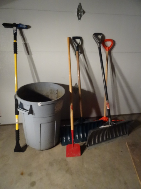 lot 148 image: 3 snow shovels. Garbage can. Extend...
