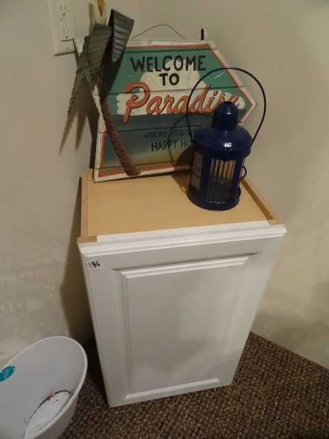 lot 186 image: Wood cabinet. 18 x 13 x 30. Wall ha...